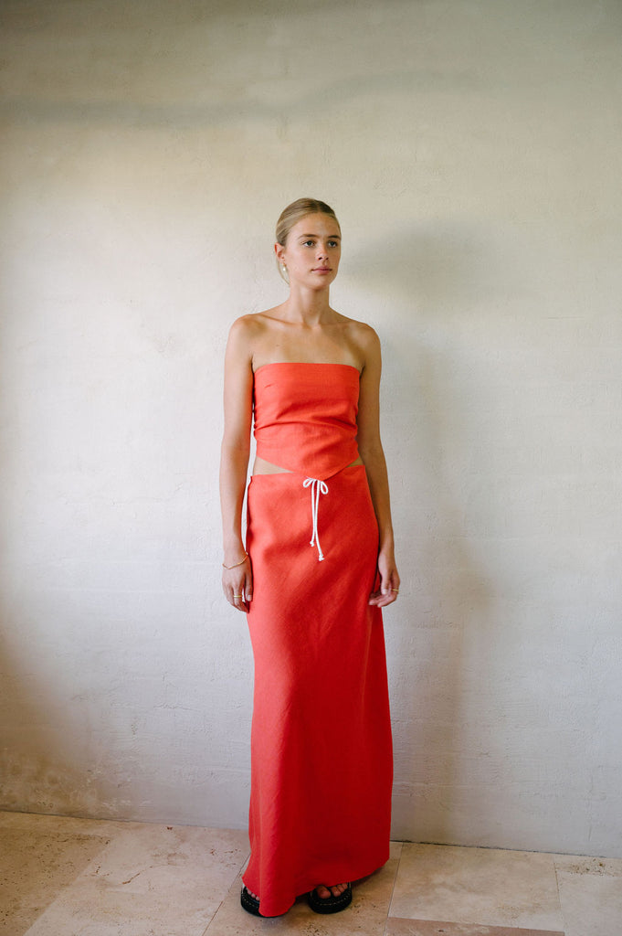 Full frontal shot of the afar boutique bias cut skirt vintage washed red 