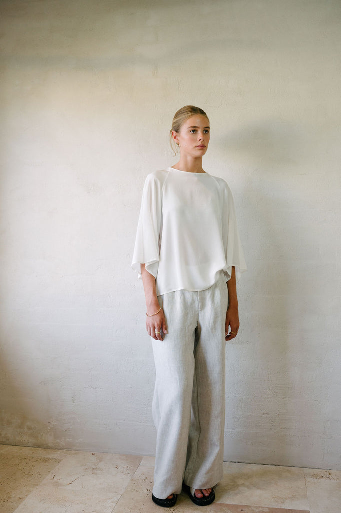 Flared Suit Pants - Natural French Flax Linen | Afar Boutique full height view with shirt looking to the side 